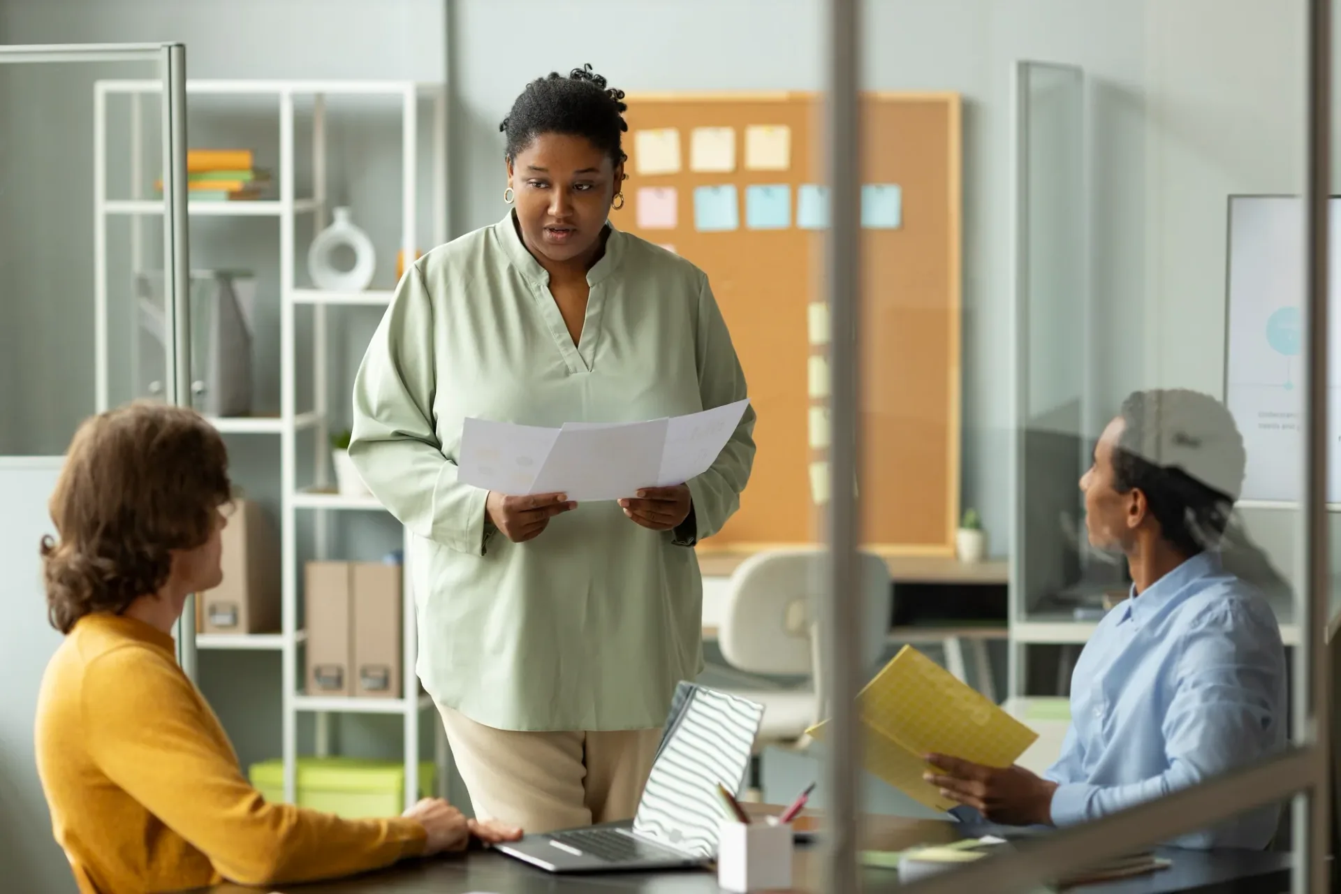 People discussing a safeguarding concern in a meeting